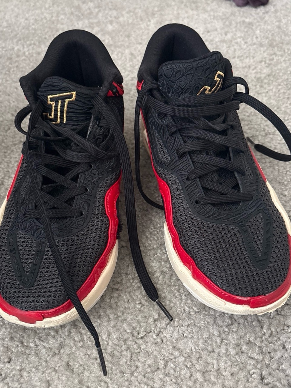 Jordan Men's Black and Red Low-Top Sneakers with Gold Logo